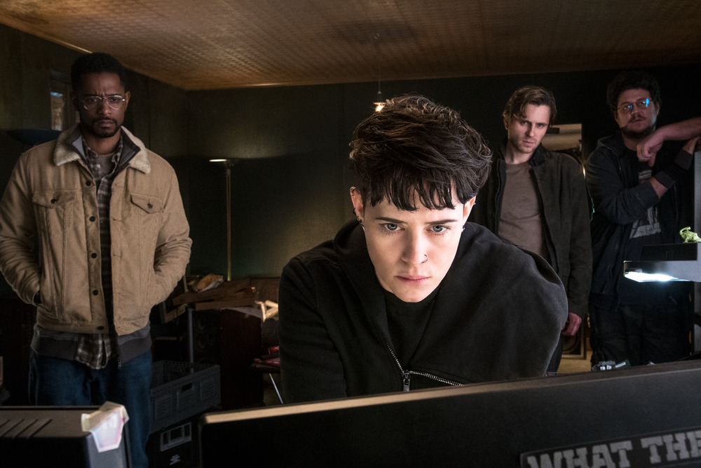 Ed Needham (Lakeith Stanfield) Lisbeth Salander (Claire Foy) Mikael Blomkvist (Sverrir Gudnason) and Plague (Cameron Britton) in THE GIRL IN THE SPIDER'S WEB. | The Little Binger | Credit: Columbia Pictures
